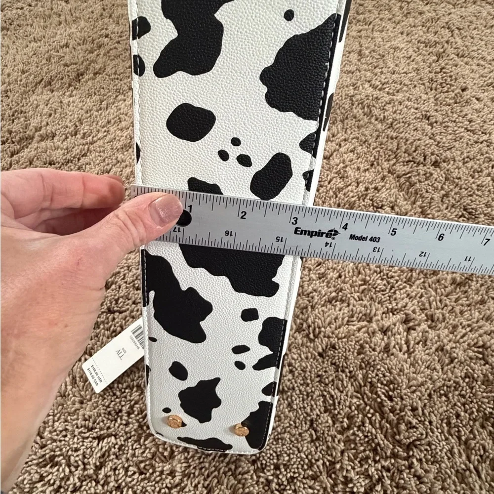 NWT new Anthropologie melie bianco east west shoulder bag cow print black white